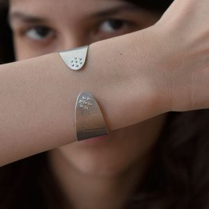 ayesha-mayadas_AMBRC020_narrow-wafer-cuff-in-sterling-silver-and-diamonds_model
